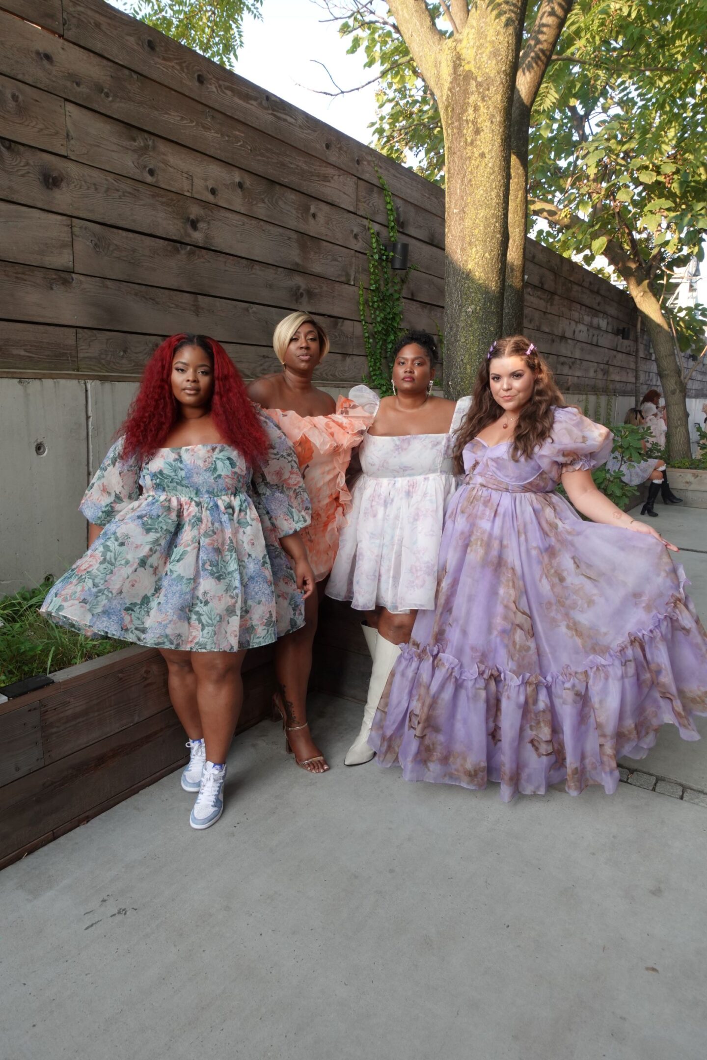 plus size women wearing selkie bridgerton style dresses at new york fashion week