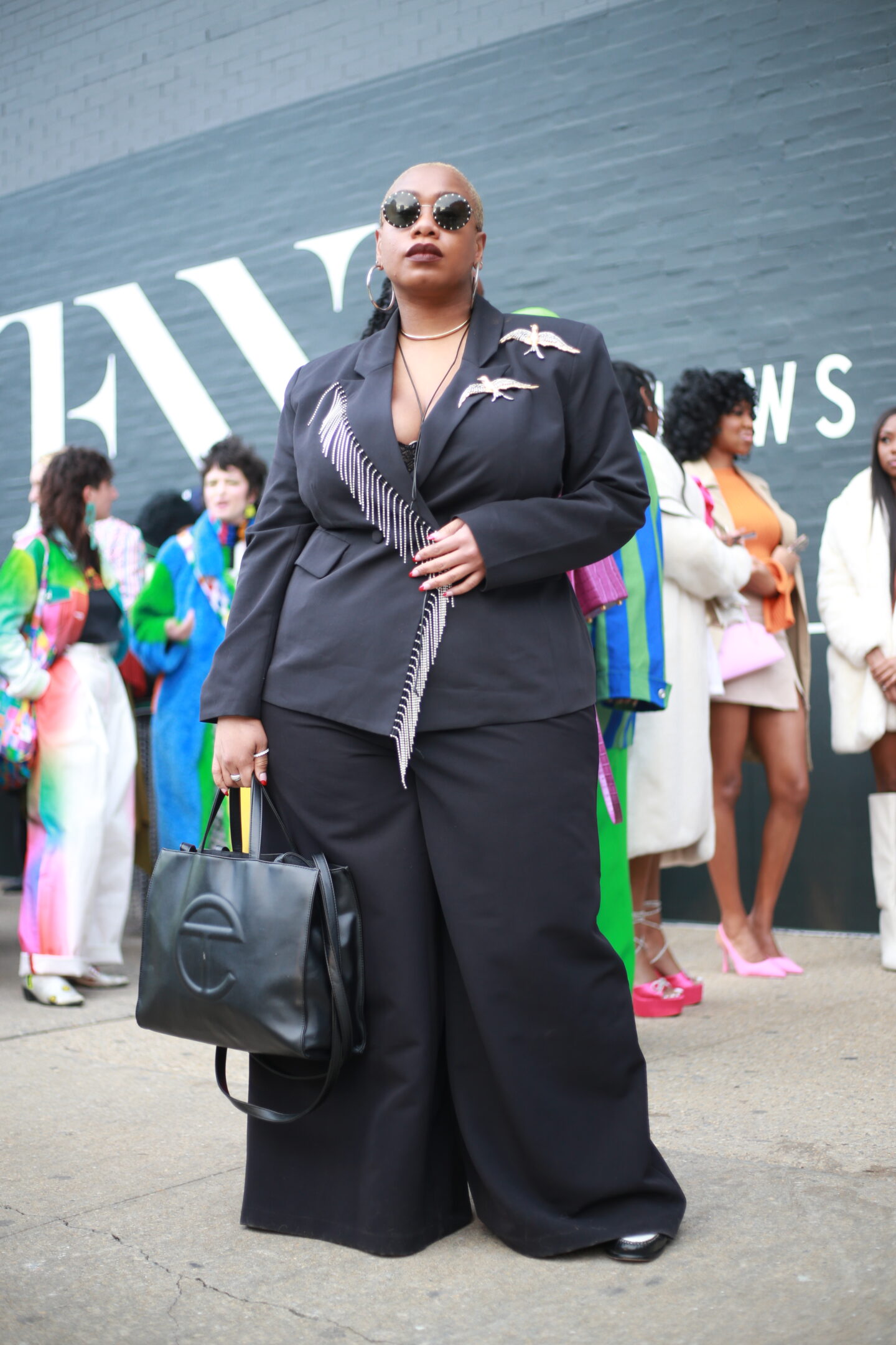 Kelly augustine in a black blazer with fringe detail.
plus size street style outfits at new york fashion week
Photo credit: Tip.Raw
