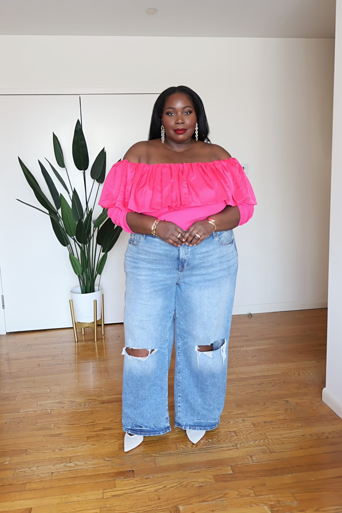 spring plus size outfits with wide leg jeans and pink ruffle off the shoulder top